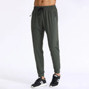 Pantalones de chándal de gimnasio para hombre, pantalones finos de Fitness, pantalones largos ajustados de secado rápido para correr, pantalones elásticos de entrenamiento para hombre