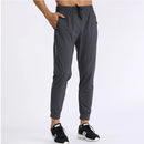 Pantalones de chándal de gimnasio para hombre, pantalones finos de Fitness, pantalones largos ajustados de secado rápido para correr, pantalones elásticos de entrenamiento para hombre
