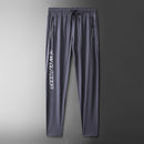 Pantalones de chándal de gimnasio para hombre, pantalones finos de Fitness, pantalones largos ajustados de secado rápido para correr, pantalones elásticos de entrenamiento para hombre