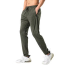 Pantalones de chándal de gimnasio para hombre, pantalones finos de Fitness, pantalones largos ajustados de secado rápido para correr, pantalones elásticos de entrenamiento para hombre