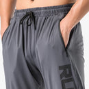 Pantalones de chándal de gimnasio para hombre, pantalones finos de Fitness, pantalones largos ajustados de secado rápido para correr, pantalones elásticos de entrenamiento para hombre