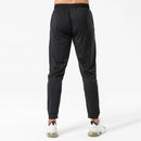 Pantalones de chándal de gimnasio para hombre, pantalones finos de Fitness, pantalones largos ajustados de secado rápido para correr, pantalones elásticos de entrenamiento para hombre