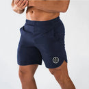 Muscleguys-pantalones cortos ajustados para hombre, pantalón de chándal de secado rápido para culturismo y Fitness