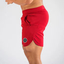 Muscleguys-pantalones cortos ajustados para hombre, pantalón de chándal de secado rápido para culturismo y Fitness