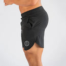 Muscleguys-pantalones cortos ajustados para hombre, pantalón de chándal de secado rápido para culturismo y Fitness