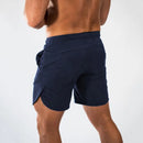 Muscleguys-pantalones cortos ajustados para hombre, pantalón de chándal de secado rápido para culturismo y Fitness