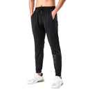 Pantalones de chándal de gimnasio para hombre, pantalones finos de Fitness, pantalones largos ajustados de secado rápido para correr, pantalones elásticos de entrenamiento para hombre
