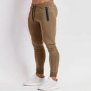 Pantalones para correr de gimnasio para hombre, pantalones de chándal ajustados para entrenamiento y correr con bolsillos con cremallera, pantalones con cordón, pantalones casuales deportivos de entrenamiento