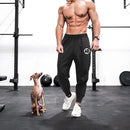 Pantalones deportivos para culturismo y gimnasio, pantalones de entrenamiento informales transpirables para hombre, pantalones de chándal finos sueltos de secado rápido con puños para correr