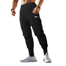 Pantalones deportivos de culturismo para hombre, pantalón de entrenamiento informal, cintura elástica, ultrafino, secado rápido, cintura alta, largo, suelto